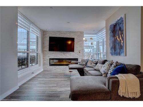 10-233 Broward Way, Innisfil, ON - Indoor Photo Showing Living Room With Fireplace