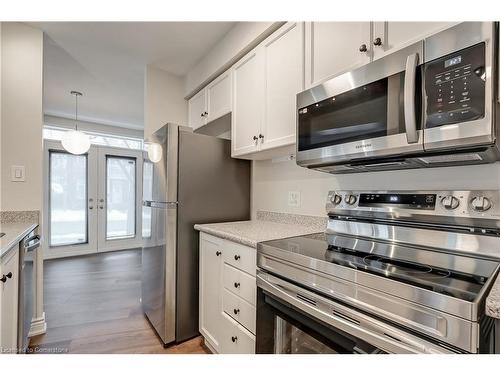 B-23 Chester Street, Oakville, ON - Indoor Photo Showing Kitchen With Stainless Steel Kitchen