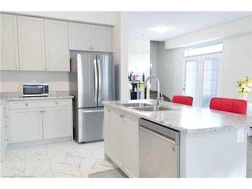 21-8317 Mulberry Drive, Niagara Falls, ON - Indoor Photo Showing Kitchen With Double Sink