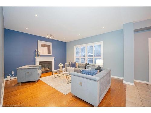 319 Robert Ferrie Drive, Kitchener, ON - Indoor Photo Showing Living Room With Fireplace