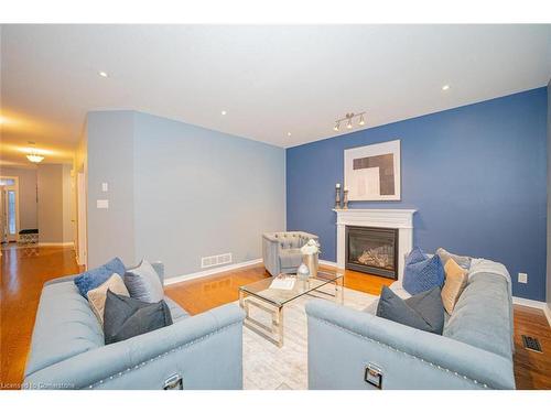 319 Robert Ferrie Drive, Kitchener, ON - Indoor Photo Showing Living Room With Fireplace