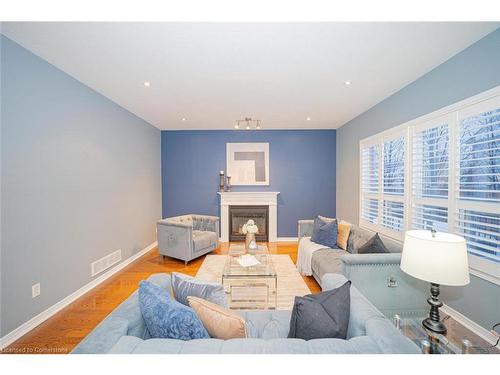 319 Robert Ferrie Drive, Kitchener, ON - Indoor Photo Showing Living Room With Fireplace