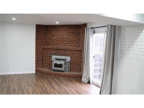 Lower-3870 Midhurst Lane, Mississauga, ON - Indoor Photo Showing Living Room With Fireplace