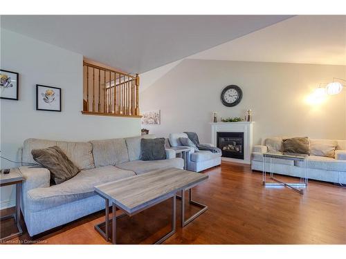 8233 Costabile Drive, Niagara Falls, ON - Indoor Photo Showing Living Room With Fireplace