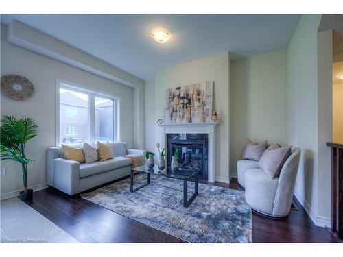 4 Poole Street, Brantford, ON - Indoor Photo Showing Living Room With Fireplace