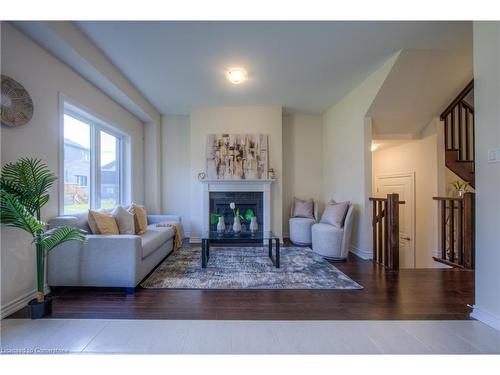 4 Poole Street, Brantford, ON - Indoor Photo Showing Living Room With Fireplace