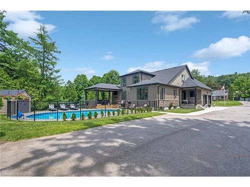 8037 Springwater Road, Aylmer, ON - Outdoor With In Ground Pool