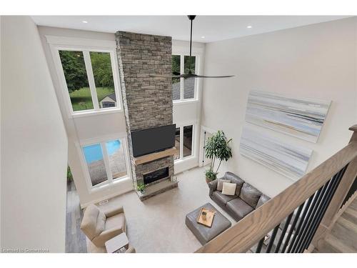 8037 Springwater Road, Aylmer, ON - Indoor With Fireplace