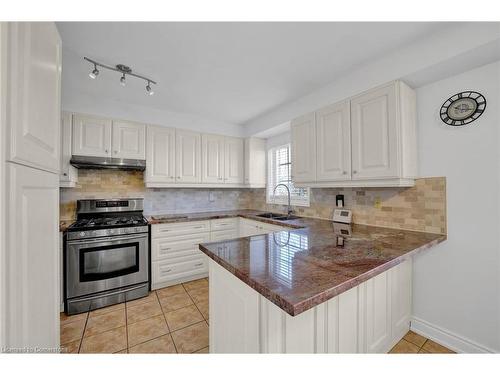 63-9800 Mclaughlin Road N, Brampton, ON - Indoor Photo Showing Kitchen With Double Sink