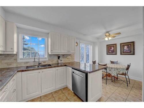 63-9800 Mclaughlin Road N, Brampton, ON - Indoor Photo Showing Kitchen With Double Sink