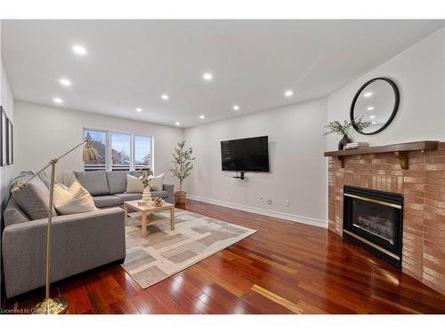 3543 Trelawny Circle, Mississauga, ON - Indoor Photo Showing Living Room With Fireplace