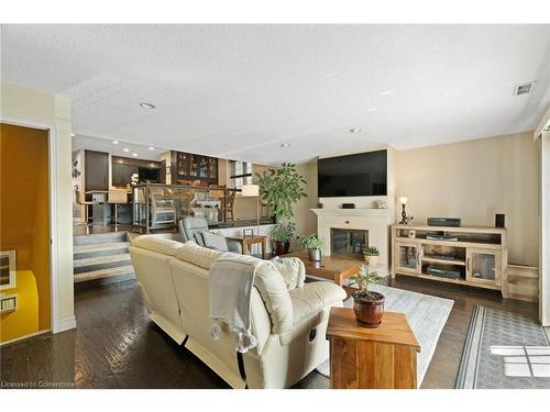 W-9-1500 Venetian Boulevard, Sarnia, ON - Indoor Photo Showing Living Room With Fireplace