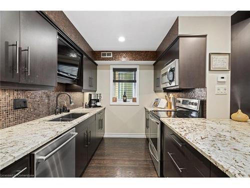 W-9-1500 Venetian Boulevard, Sarnia, ON - Indoor Photo Showing Kitchen With Double Sink With Upgraded Kitchen