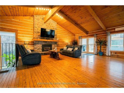 795744 Grey Road 19, The Blue Mountains, ON - Indoor Photo Showing Living Room With Fireplace