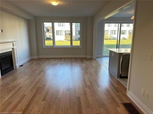 857 Knights Lane, Woodstock, ON - Indoor Photo Showing Other Room With Fireplace