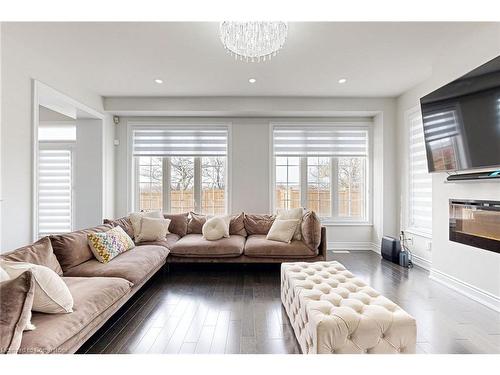 4 Brigham Avenue, Binbrook, ON - Indoor Photo Showing Living Room With Fireplace