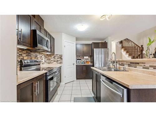 65 Curzon Crescent, Guelph, ON - Indoor Photo Showing Kitchen With Double Sink