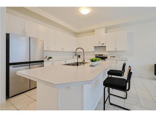 15 Sanford Circle, Springwater, ON - Indoor Photo Showing Kitchen With Double Sink