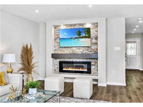 Upper-608 Woolgrass Avenue, Waterloo, ON - Indoor Photo Showing Living Room With Fireplace