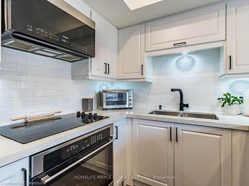 14-93 The Queensway Way, Toronto, ON - Indoor Photo Showing Kitchen With Double Sink With Upgraded Kitchen