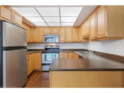 311-310 Mill Street, Peel, ON - Indoor Photo Showing Kitchen With Double Sink