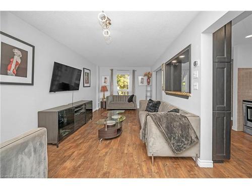 25 Westvillage Drive, Hamilton, ON - Indoor Photo Showing Living Room With Fireplace