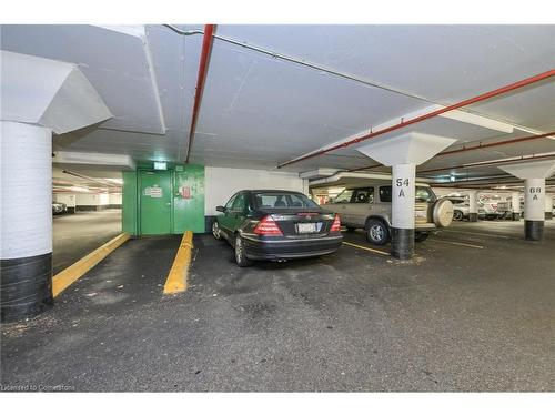 308-305 Webb Drive, Mississauga, ON - Indoor Photo Showing Garage