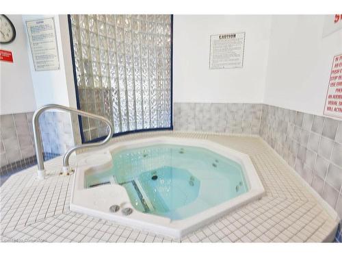 501-25 Trailwood Drive, Mississauga, ON - Indoor Photo Showing Other Room With In Ground Pool