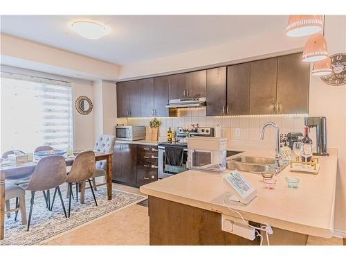 4-60 Fairwood Circle, Brampton, ON - Indoor Photo Showing Kitchen With Double Sink