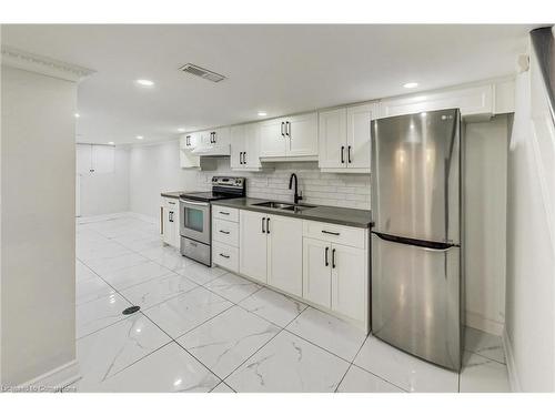 763 Tate Avenue, Hamilton, ON - Indoor Photo Showing Kitchen With Double Sink