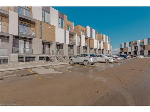 40-142 Foamflower Place, Waterloo, ON - Outdoor With Balcony With Facade