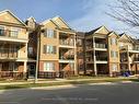 208-263 Georgian Drive, Oakville, ON  - Outdoor With Balcony With Facade 