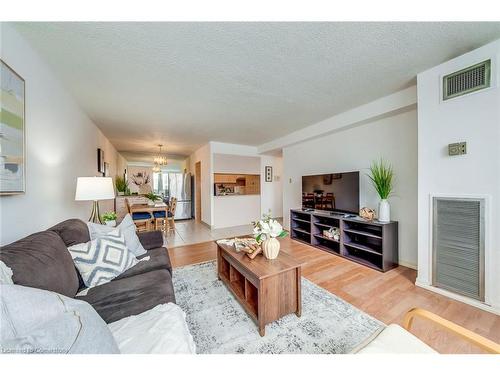 301-40 Bay Mills Boulevard, Scarborough, ON - Indoor Photo Showing Living Room