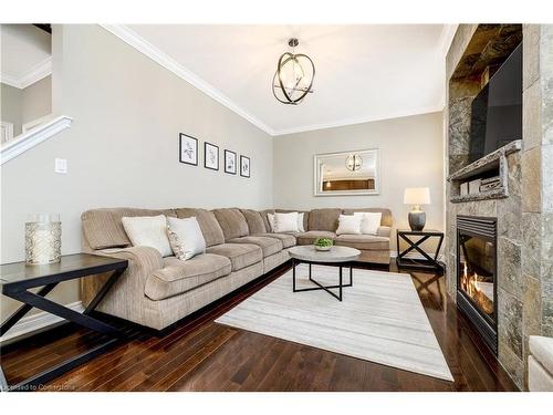 537 Grant Way, Milton, ON - Indoor Photo Showing Living Room With Fireplace