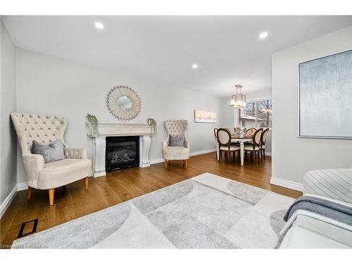 2401 St Frances Drive, Burlington, ON - Indoor Photo Showing Living Room With Fireplace