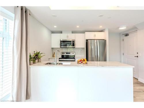 301-153 Wilson Street W, Hamilton, ON - Indoor Photo Showing Kitchen With Stainless Steel Kitchen With Double Sink