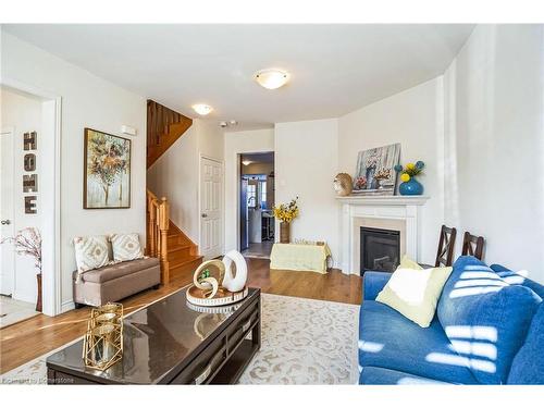 165 Etheridge Avenue, Milton, ON - Indoor Photo Showing Living Room With Fireplace