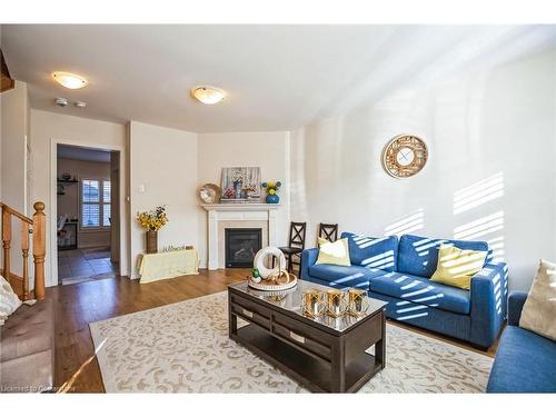 165 Etheridge Avenue, Milton, ON - Indoor Photo Showing Living Room With Fireplace