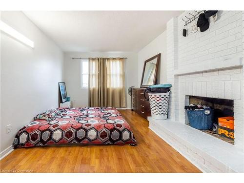 30 Rodwell Court, Brampton, ON - Indoor Photo Showing Bedroom With Fireplace