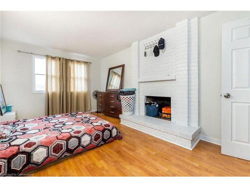 30 Rodwell Court, Brampton, ON - Indoor Photo Showing Bedroom With Fireplace