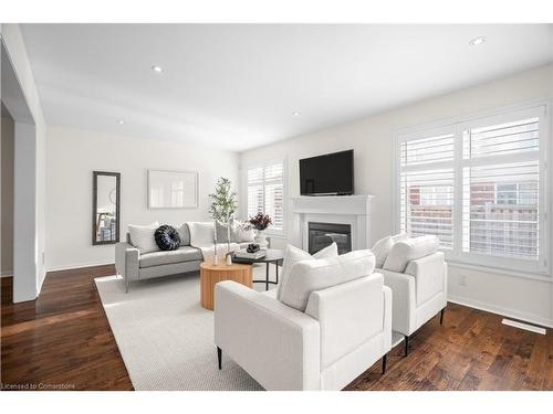 1115 Solomon Court, Milton, ON - Indoor Photo Showing Living Room With Fireplace