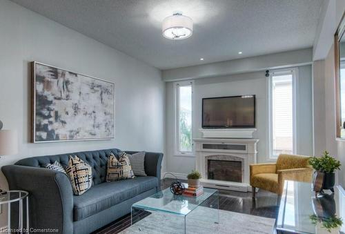 76 Isabella Street, Kitchener, ON - Indoor Photo Showing Living Room With Fireplace