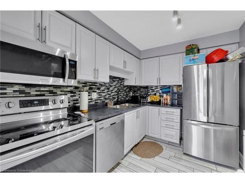 16 Mullis Crescent, Brampton, ON - Indoor Photo Showing Kitchen With Stainless Steel Kitchen With Double Sink