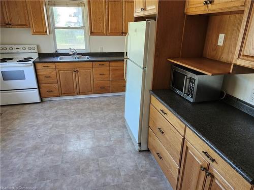 25 Amos Avenue W, Waterloo, ON - Indoor Photo Showing Kitchen With Double Sink