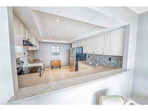 606-320 Mill Street S, Peel, ON - Indoor Photo Showing Kitchen With Double Sink