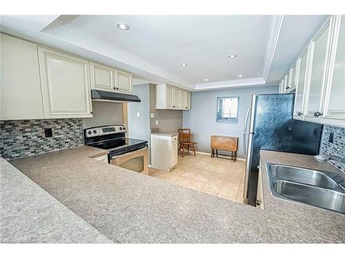 606-320 Mill Street S, Peel, ON - Indoor Photo Showing Kitchen With Double Sink