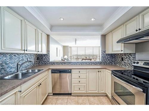 606-320 Mill Street S, Peel, ON - Indoor Photo Showing Kitchen With Double Sink