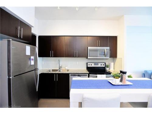 1413-55 Speers Road Drive, Oakville, ON - Indoor Photo Showing Kitchen With Stainless Steel Kitchen With Double Sink