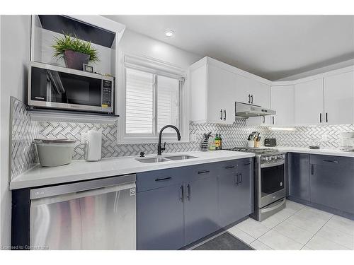 1751 Coronation Drive, London, ON - Indoor Photo Showing Kitchen With Double Sink With Upgraded Kitchen