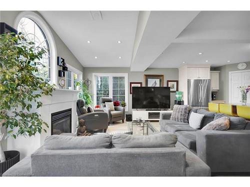 99 Westwinds Drive, London, ON - Indoor Photo Showing Living Room With Fireplace